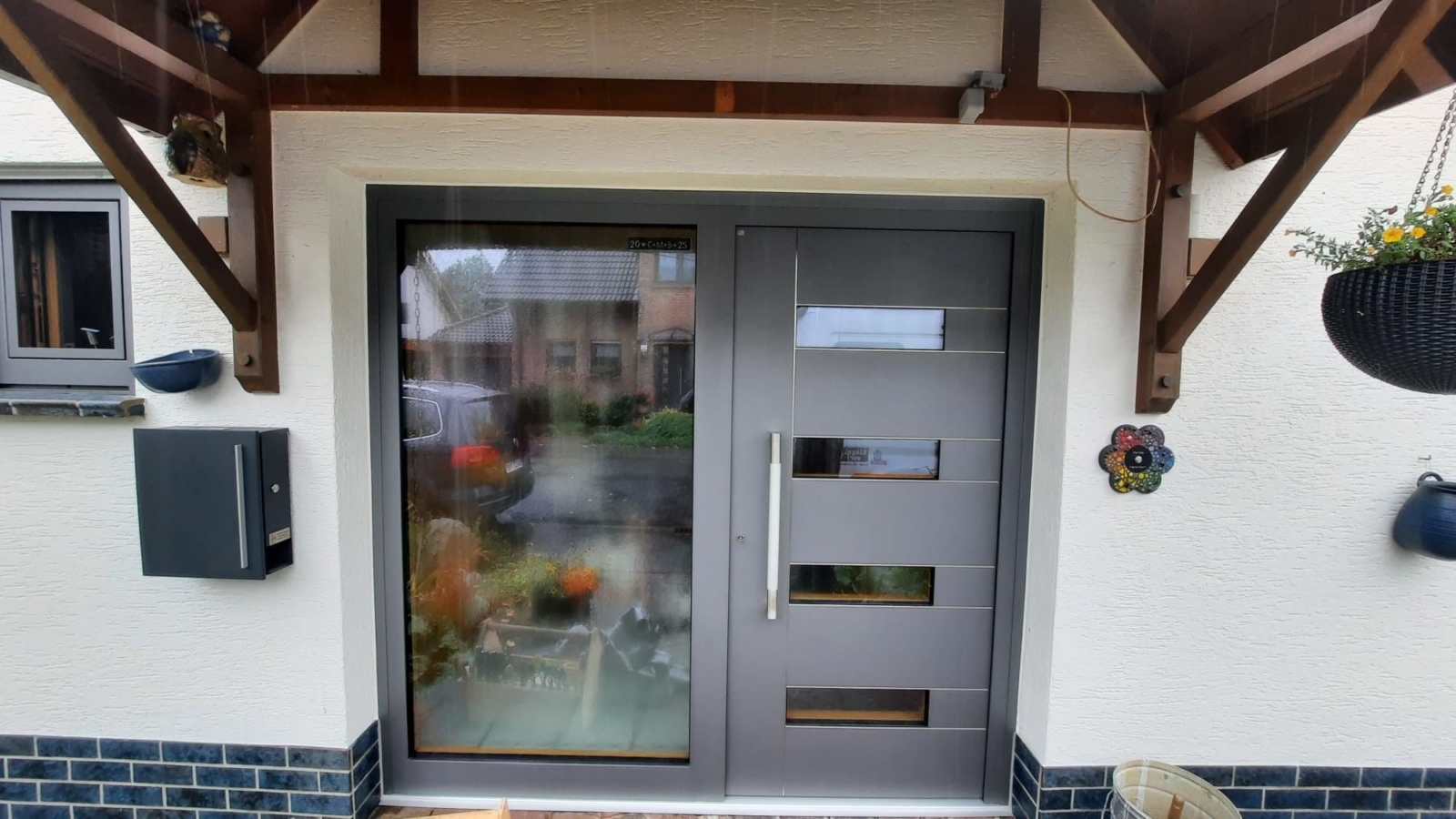 Von der Reparatur zur Modernisierung: Holz-Alu-Haustür und Fenster