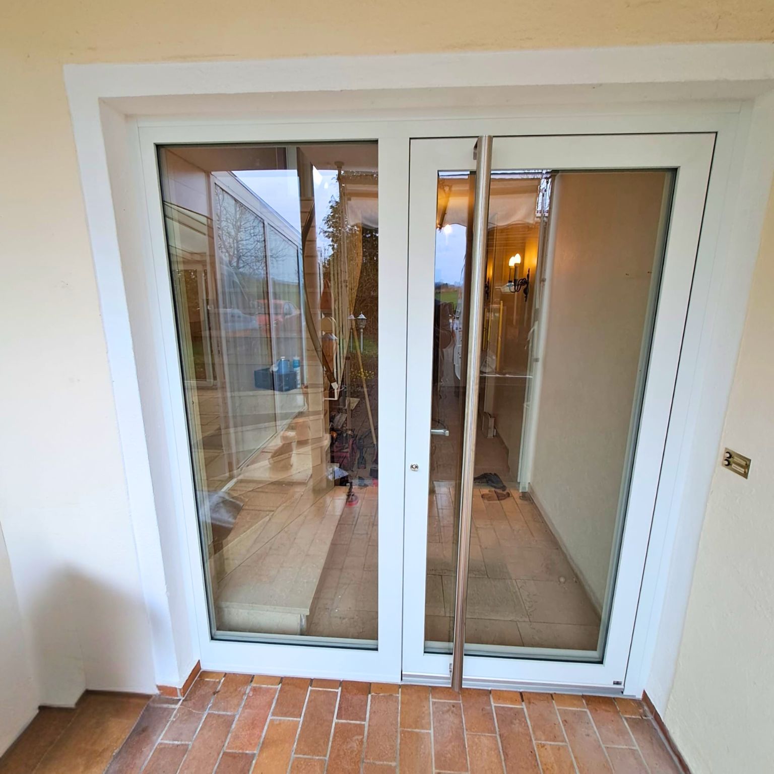 Modernisierung von Haustür und Treppenhausfenster