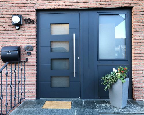 Erneuerung der Haustür- und Fensteranlage nachher
